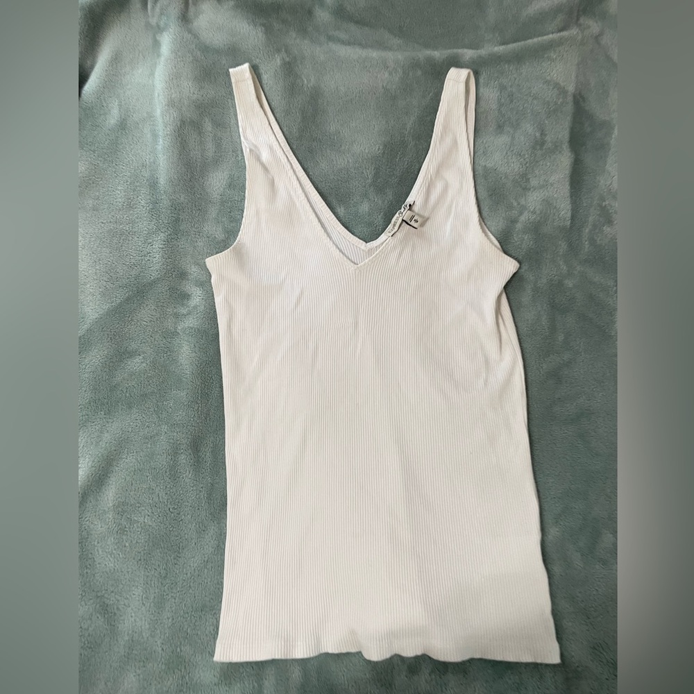 V cut front and back tank top.
